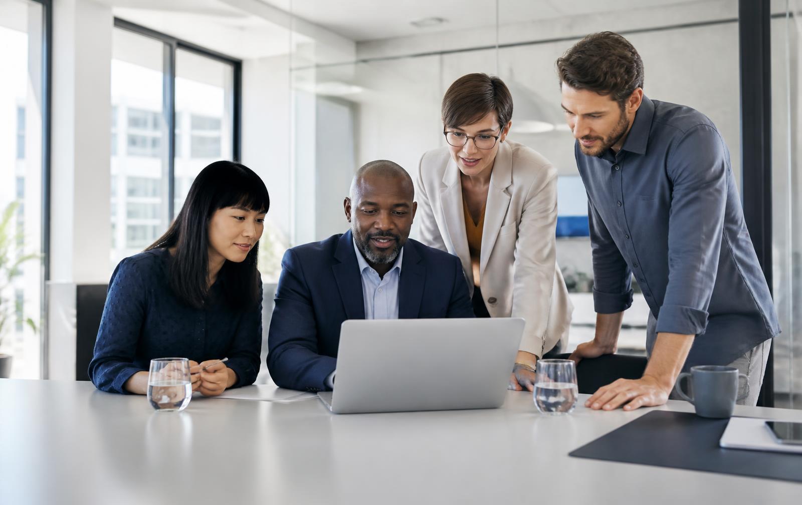 Finance professionals reviewing business performance